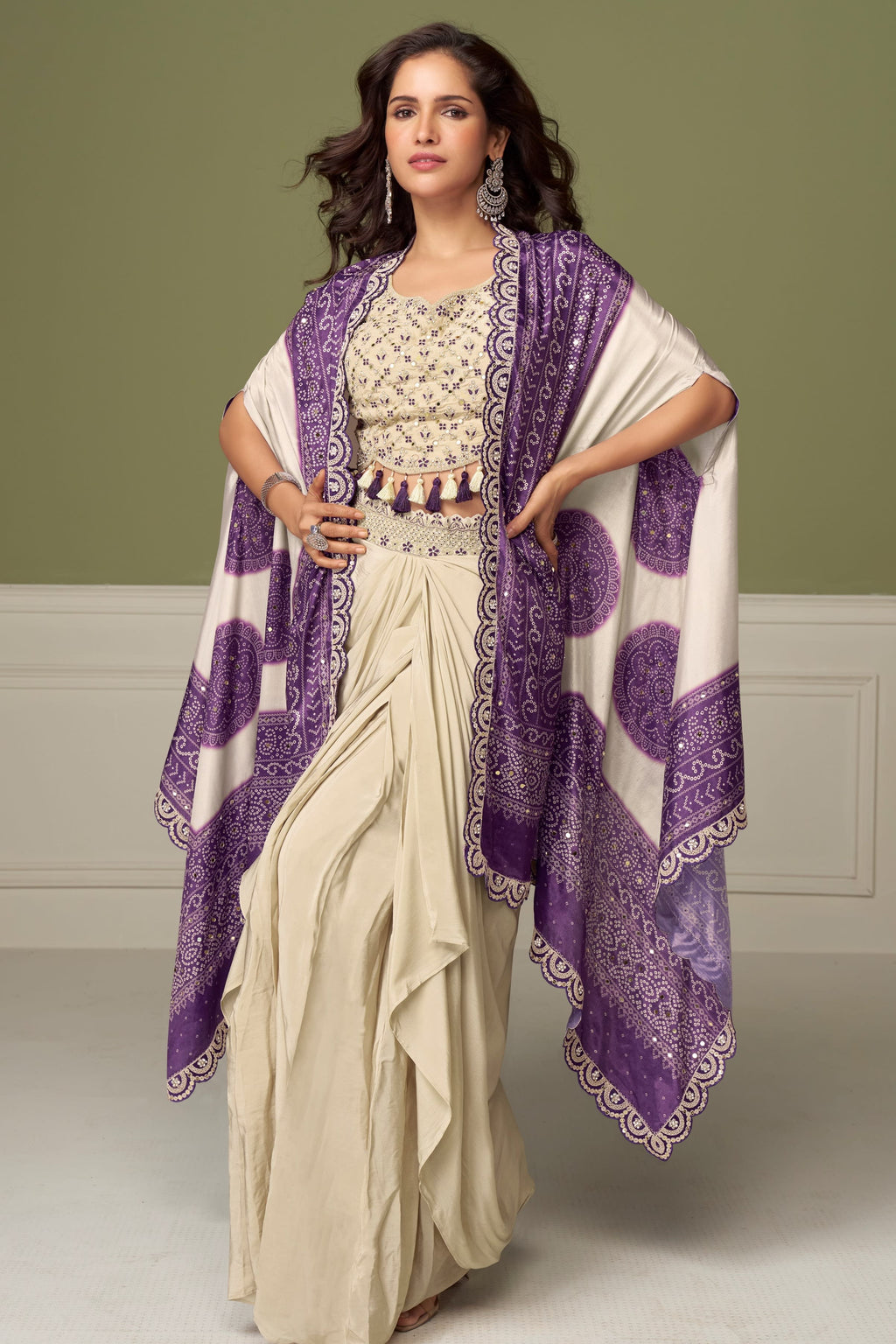Full-length front view of a purple festive wear for women plazo and blouse set in chinon silk with embroidery and print work.