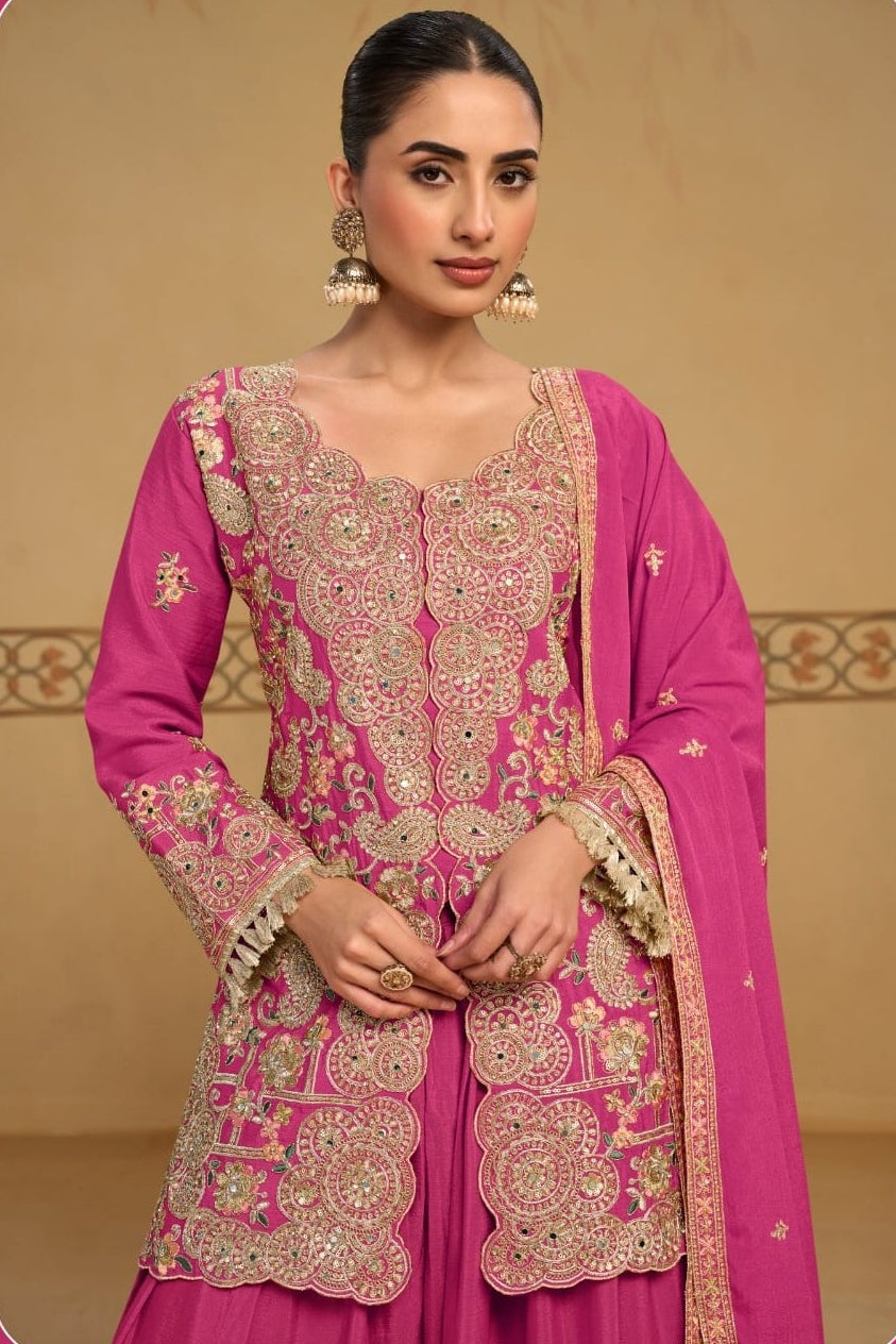 Close-up view of the neckline embroidery of the Magenta indian palazzo suit, showing the embroidered neckline and sleeve detailing on chinon silk.
