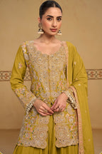 Close-up view of the neckline embroidery of the Mustard Yellow palazzo suit, showing the embroidered neckline and sleeve detailing on chinon silk.