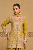 Torso view showing the thread and sequins embroidery of the Mustard Yellow palazzo kurta set, highlighting the thread and sequins work on the chinon silk kameez.