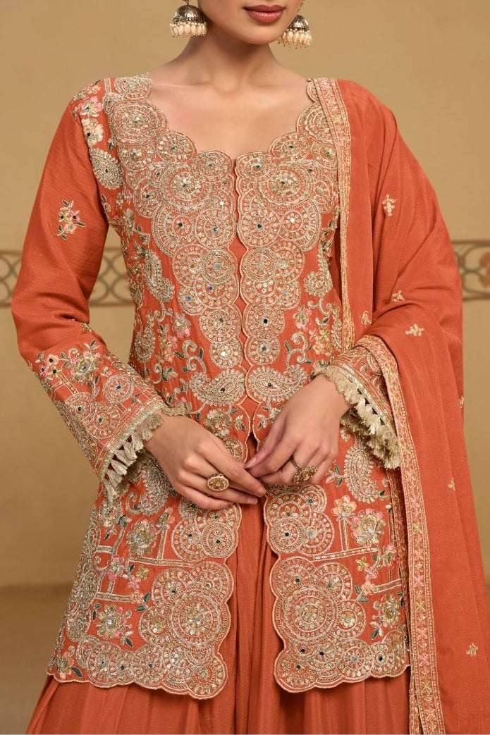 Torso view showing the thread and sequins embroidery of the Rust palazzo suit india, highlighting the thread and sequins work on the chinon silk kameez.