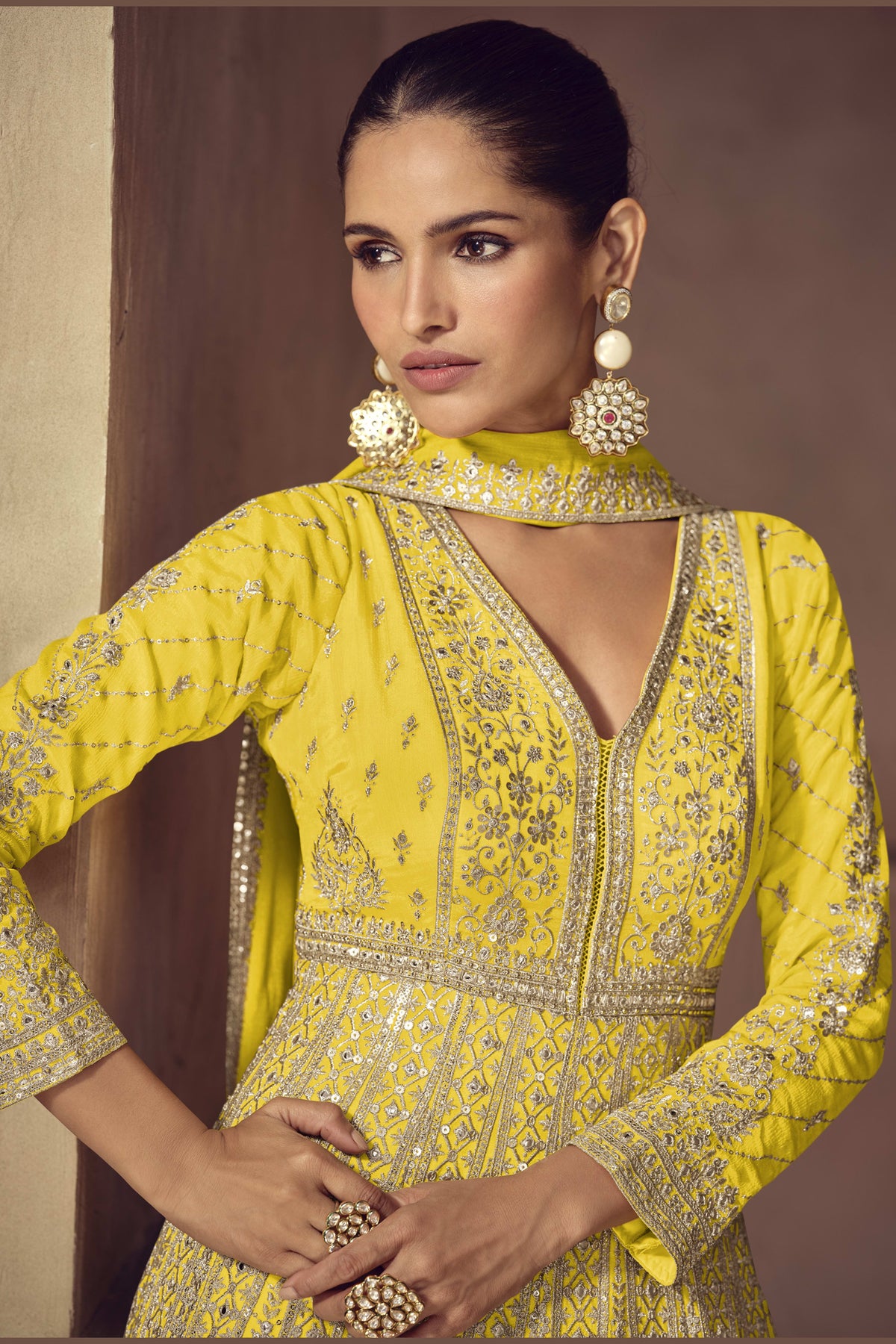 Back view of yellow anarkali for wedding with embroidered churidar and dupatta