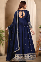 Full-length back view of a navy blue anarkali dress for wedding in art silk with a keyhole back neckline with dori tie, sequin and thread embroidery.