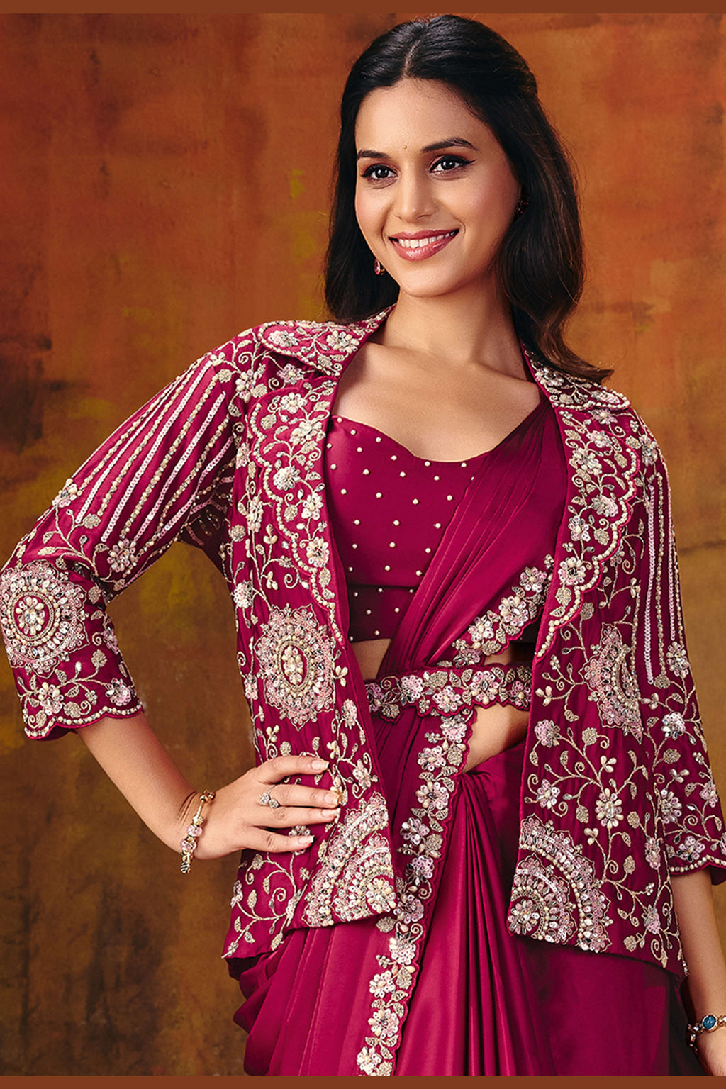 Dark red satin silk saree blouse neckline closeup with sequin embroidery