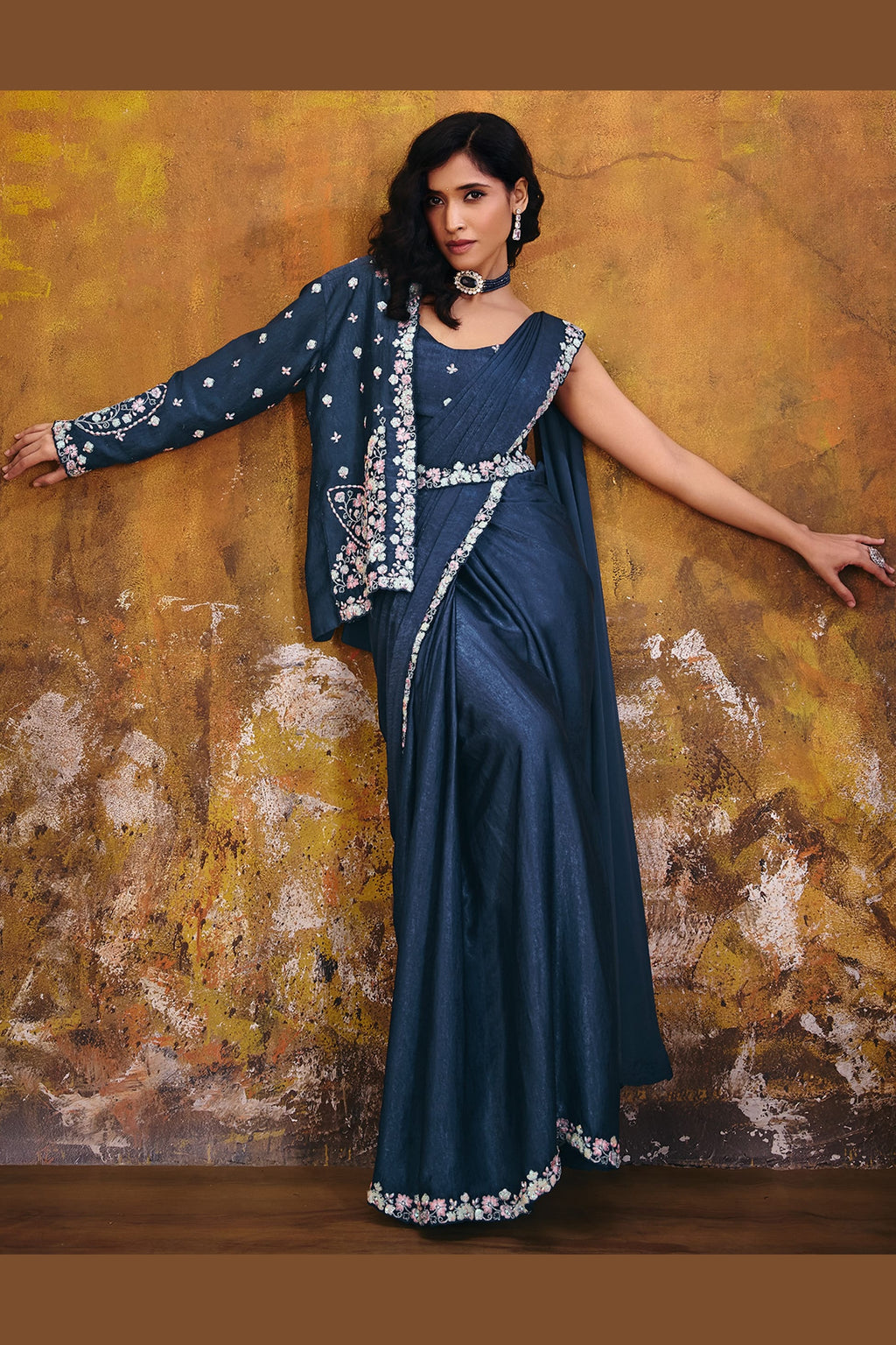 Navy blue party wear saree blouse closeup with sequin and pearl embroidery