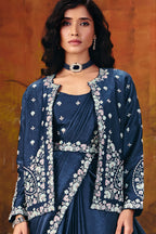Designer navy blue saree drape closeup showing sequin border
