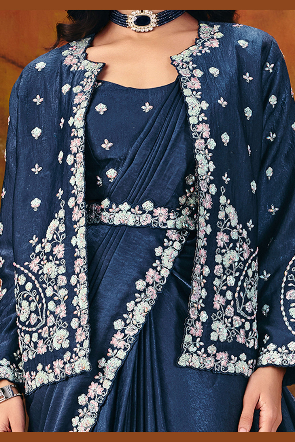 Navy blue party wear saree back view of the embroidered jacket