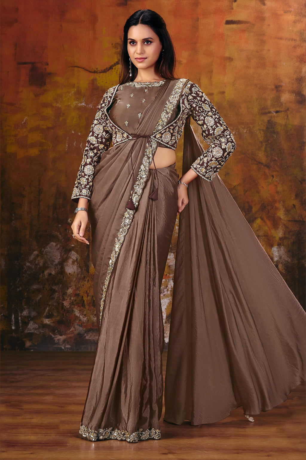 Brown saree for reception side view with flowing pleated drape