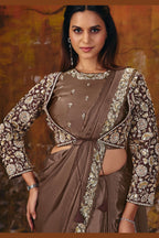 Brown saree for reception closeup of pearl and stone border work