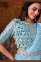 Light blue sequin saree blouse closeup with floral applique embroidery