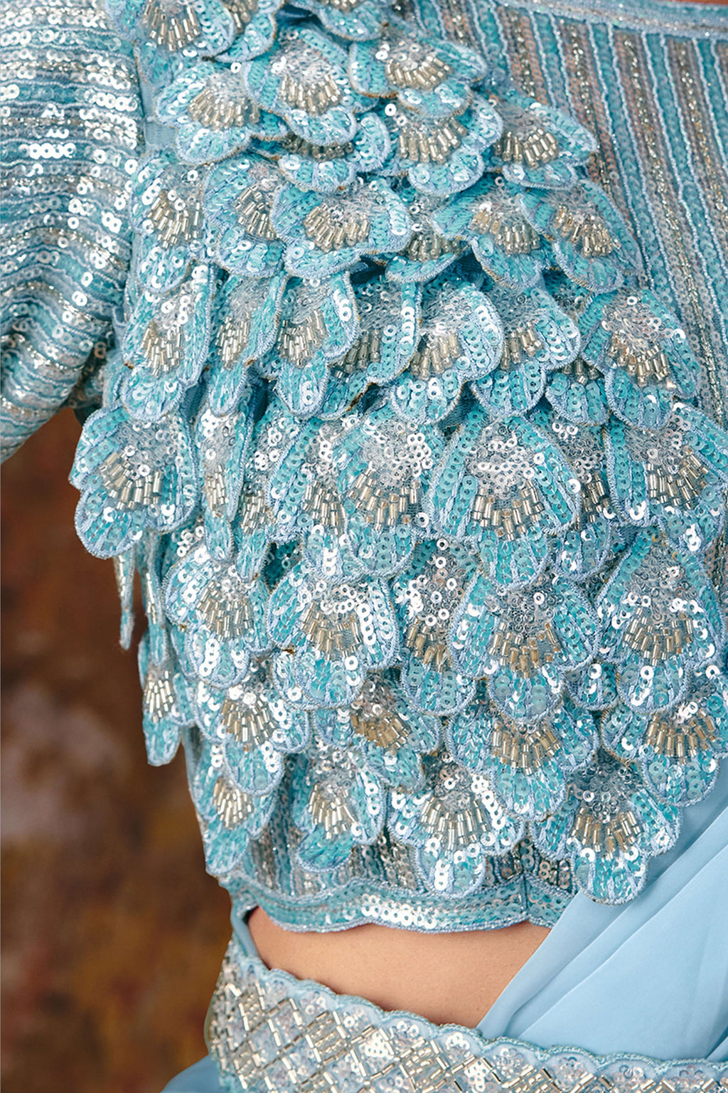 Light blue saree for diwali lower drape closeup showing sequin border