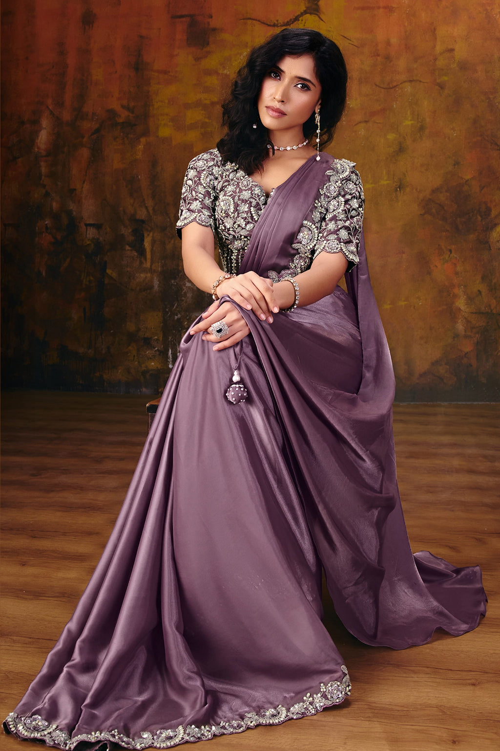 Mauve embroidered saree blouse closeup with sequin and stone detail
