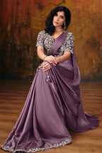 Mauve embroidered saree blouse closeup with sequin and stone detail