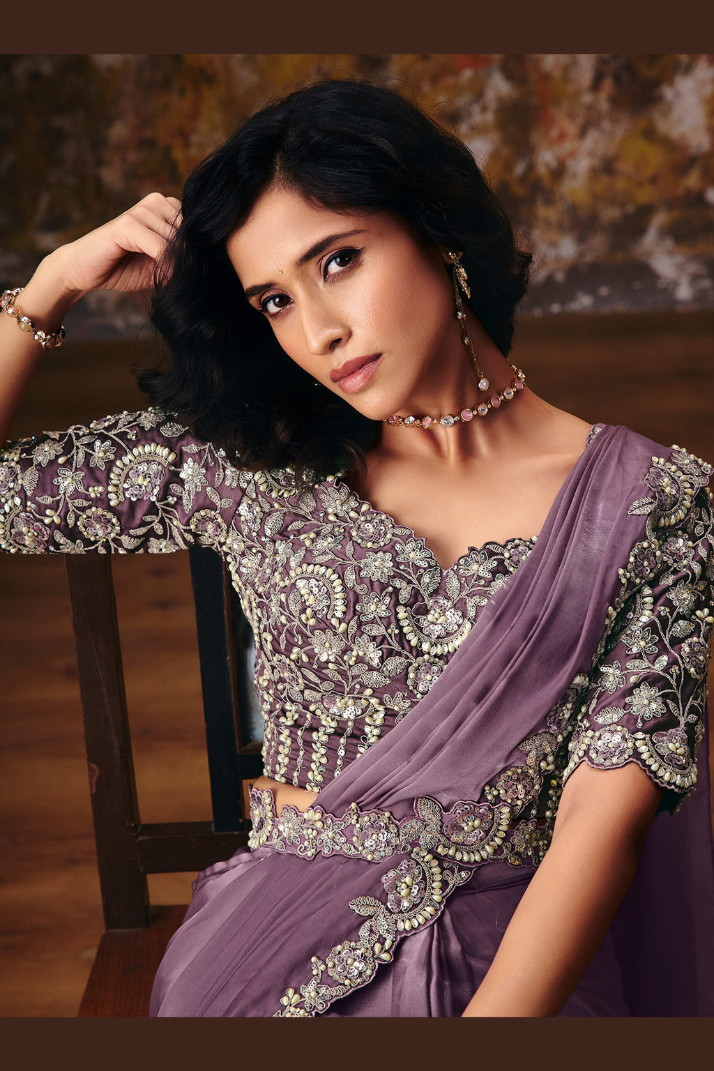 Mauve saree for engagement drape closeup showing embellished border