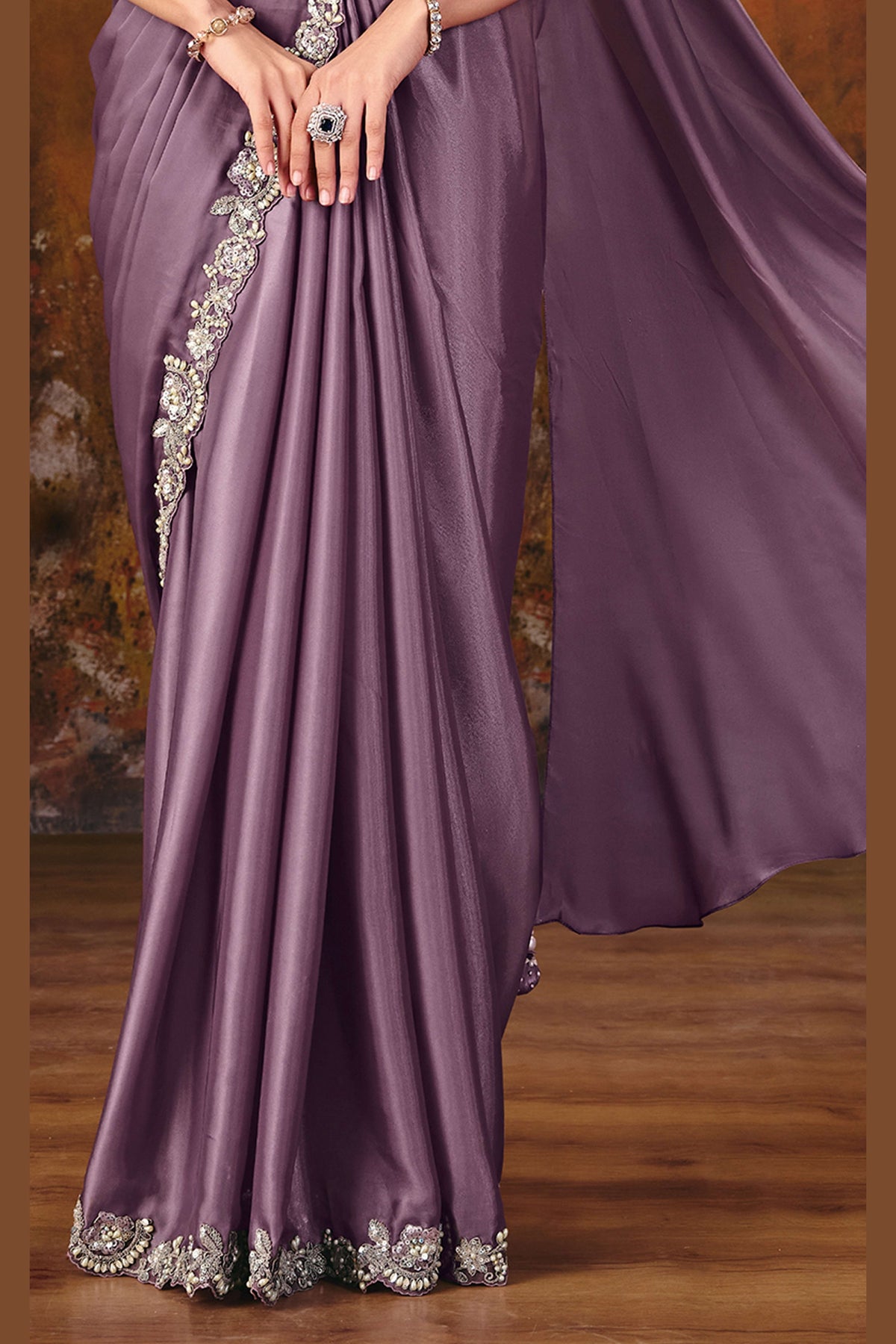 Mauve saree for engagement closeup of pearl border work