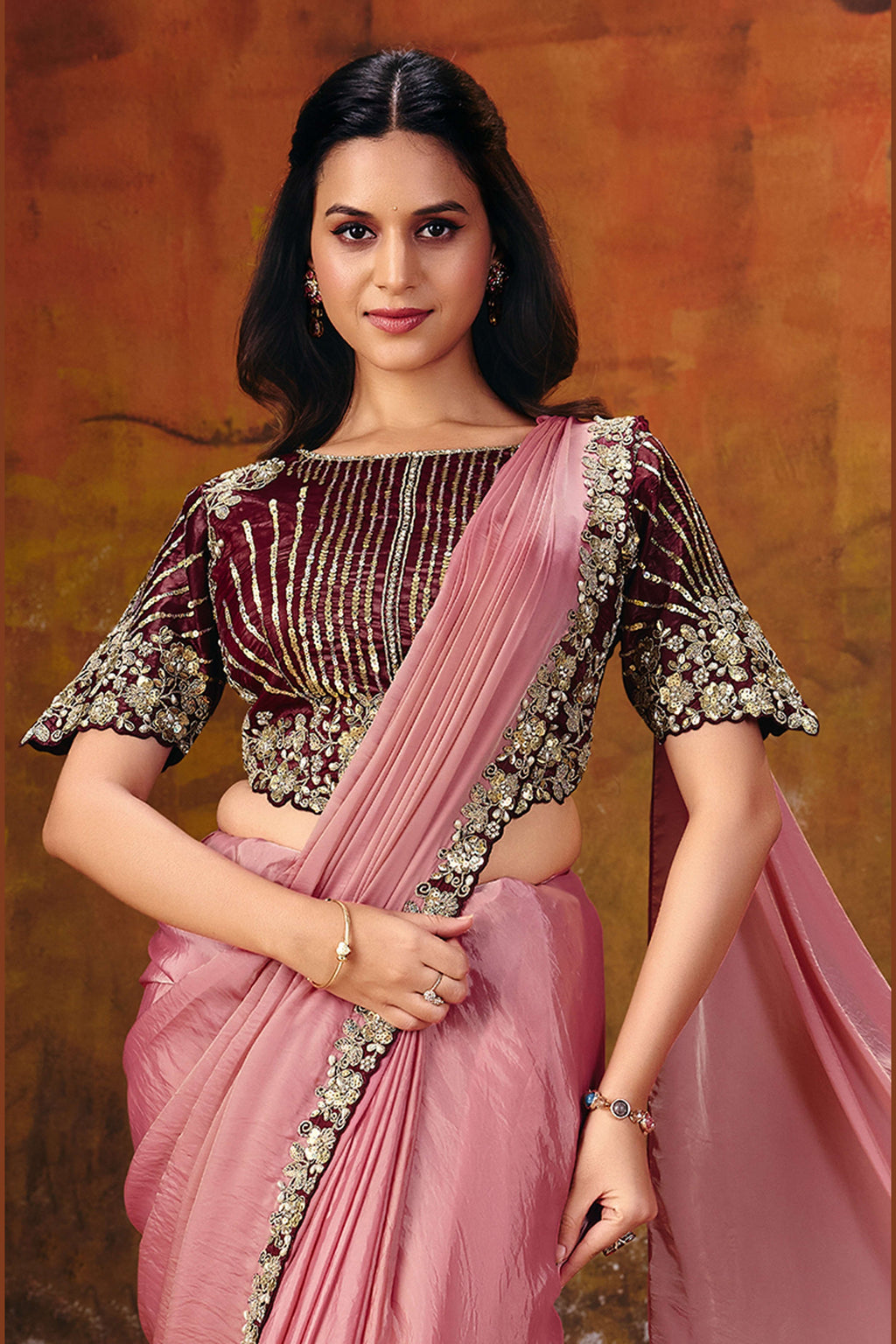 Pink ready to wear saree lower drape closeup showing sequin border