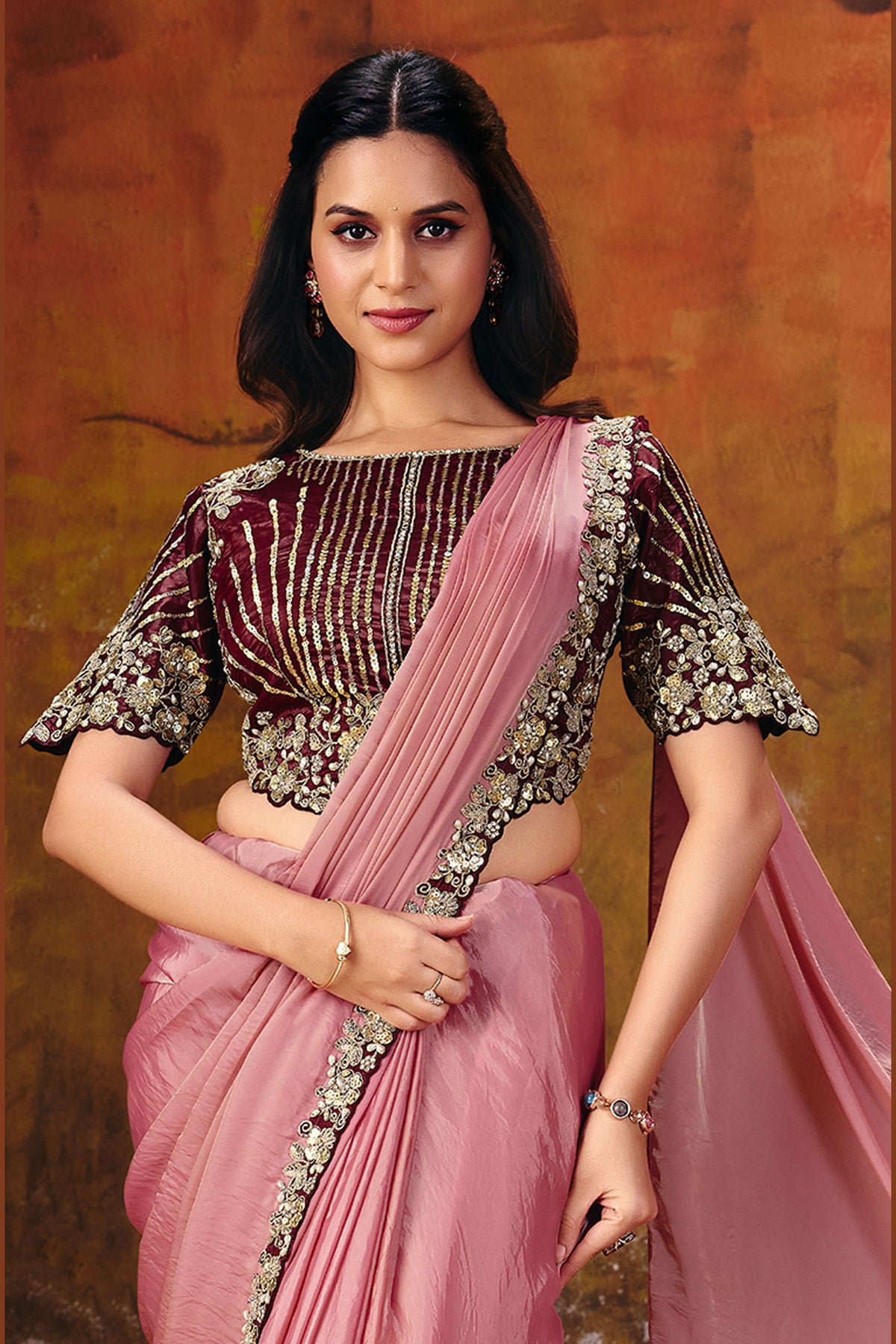 Pink ready to wear saree lower drape closeup showing sequin border