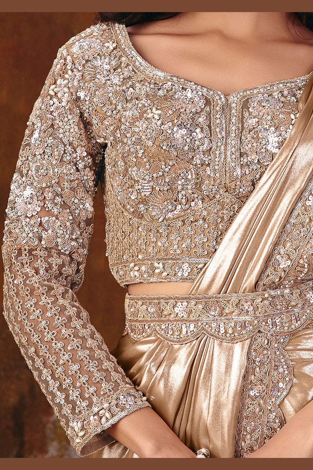 Champagne golden sequin saree side view with flowing foil satin drape