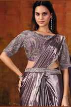 Mauve embroidered saree drape detail with beaded border