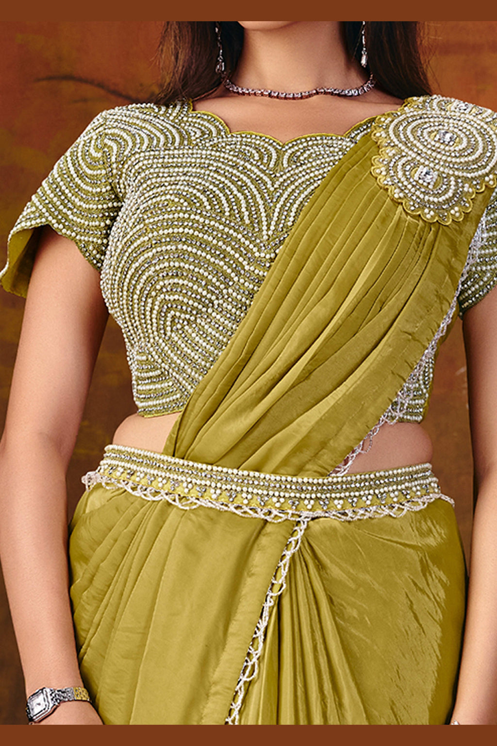 Olive satin silk saree side view with flowing drape