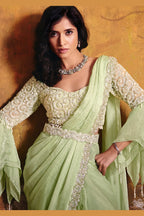 Mint green embroidered saree blouse closeup with sequin and bead detail
