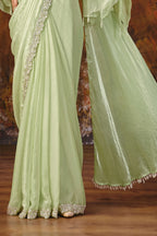Mint green party wear saree drape detail with embellished border