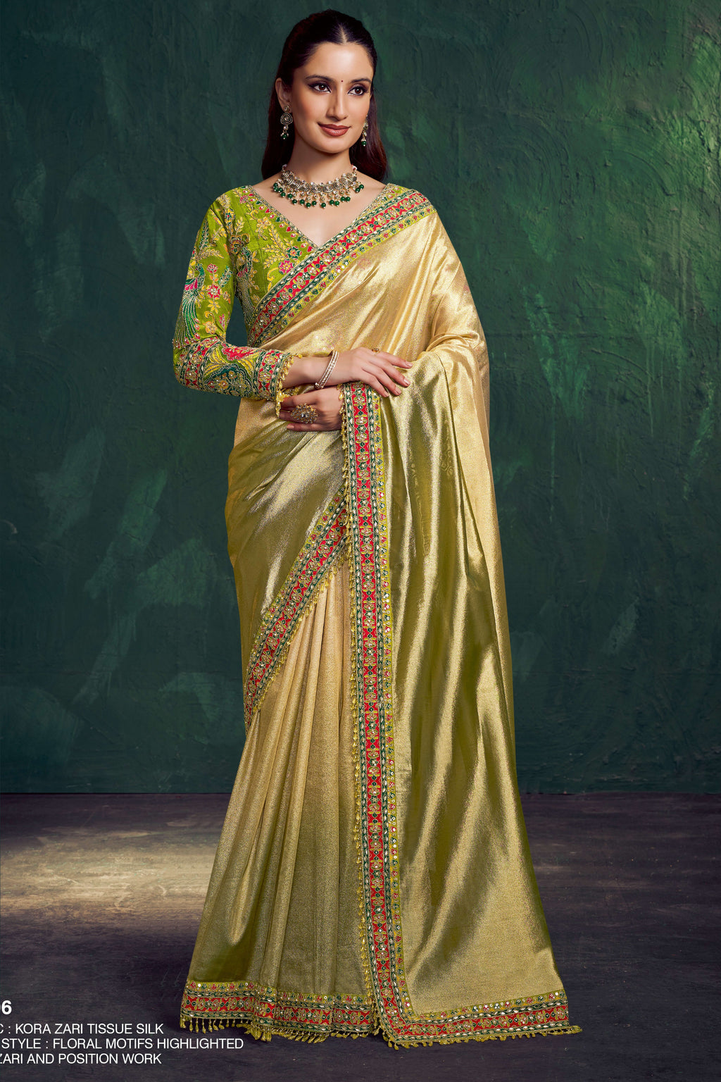 Yellow green silk saree for wedding with zari work, full front view of the draped tissue silk saree