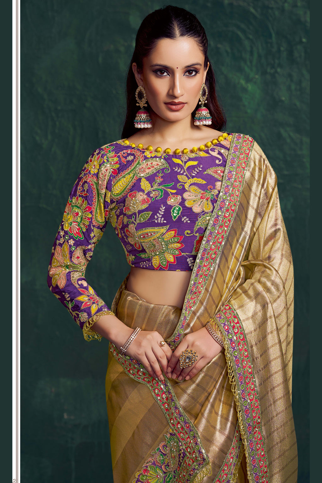 Champagne golden sequin saree, front view showing the floral motif embellished blouse and pleats
