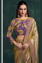 Champagne golden sequin saree, front view showing the floral motif embellished blouse and pleats