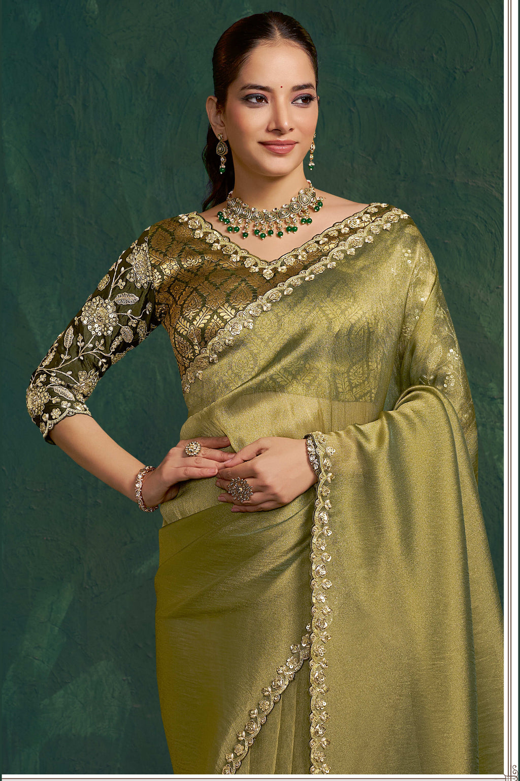 Olive green saree for party, front view showing the sequin embroidered blouse and zari tissue silk drape