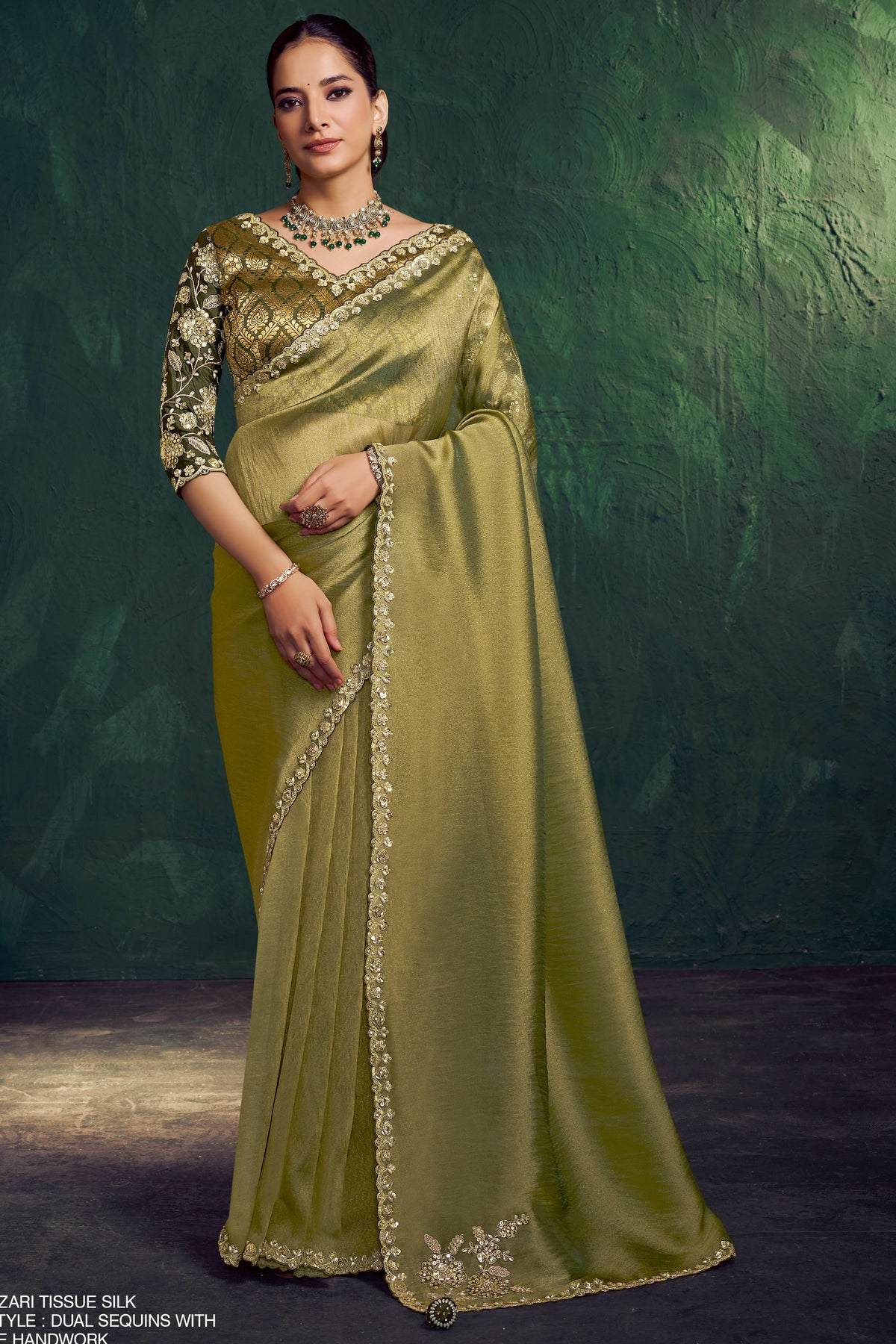 Olive green party wear saree with sequin embroidery and handwork, full front view of the draped saree
