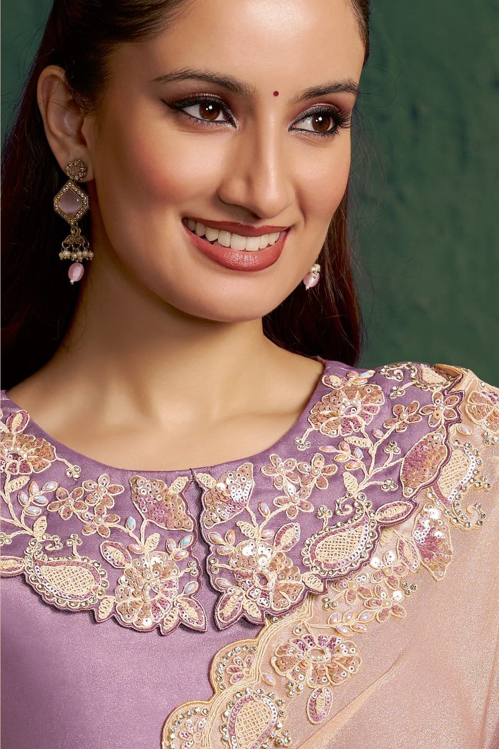Lavender saree for engagement, upper-body closeup of the embroidery and diamond work detail