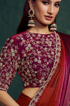 Maroon embroidered saree, upper-body closeup of the bead work and sequin embroidery detail