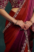 Maroon saree for reception, waist-down view of the two-tone shaded satin pleats and drape