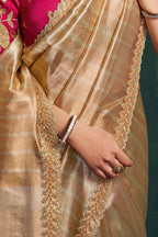 Champagne golden sequin saree, waist-down view of the pleats and shimmering drape