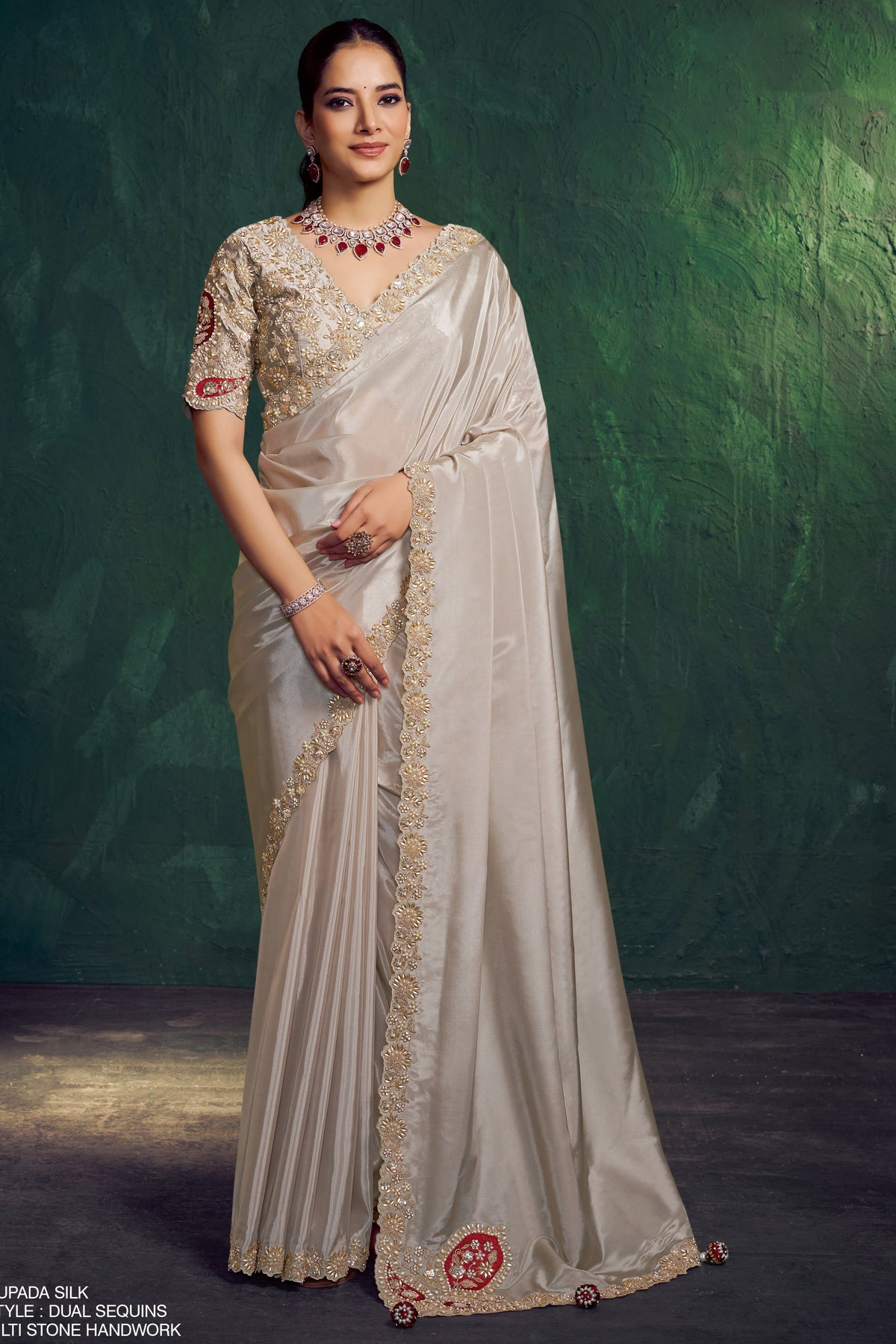 Off white saree with blouse, sequin embroidery, handwork and stone work, full front view of the draped saree
