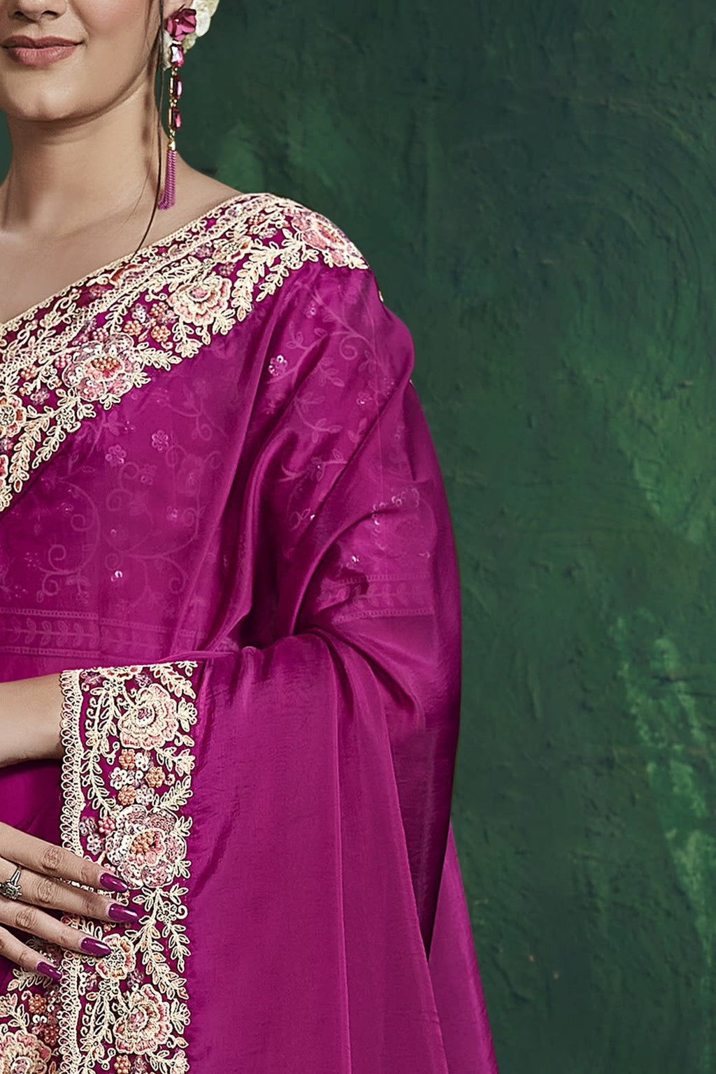 Magenta sequin saree, upper-body closeup of the handwork and sequin embroidery detail