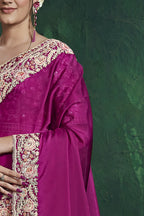 Magenta sequin saree, upper-body closeup of the handwork and sequin embroidery detail