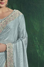 Pastel blue sequin saree, upper-body closeup of the sequin work and handwork detail