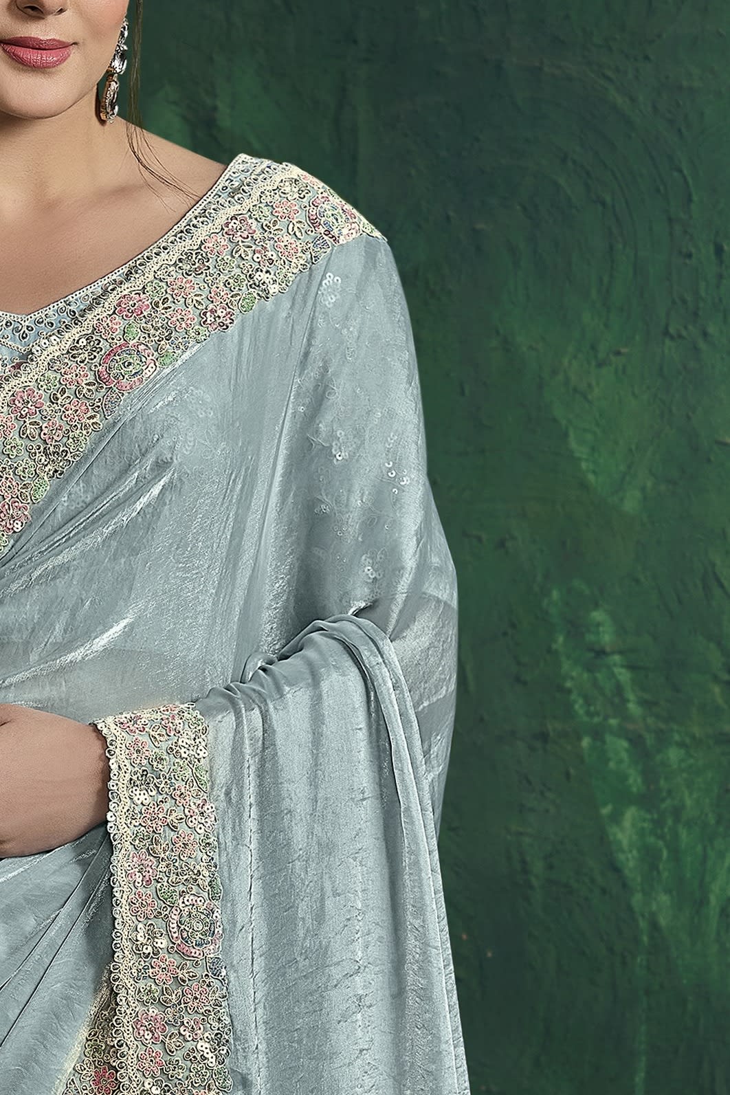 Pastel blue sequin saree, upper-body closeup of the sequin work and handwork detail