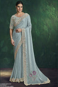 Pastel blue satin silk saree with sequin and handwork, full front view of the two-tone satin silk drape