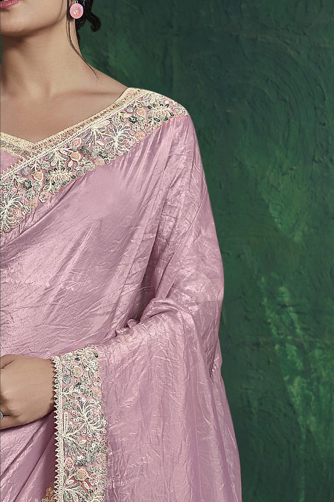 Baby pink sequin saree, upper-body closeup of the sequin embroidery and handwork detail