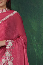 Reddish pink sequin saree, upper-body closeup of the sequin embroidery and handwork detail