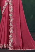 Reddish pink embroidered saree, waist-down view of the pleats and shimmering drape