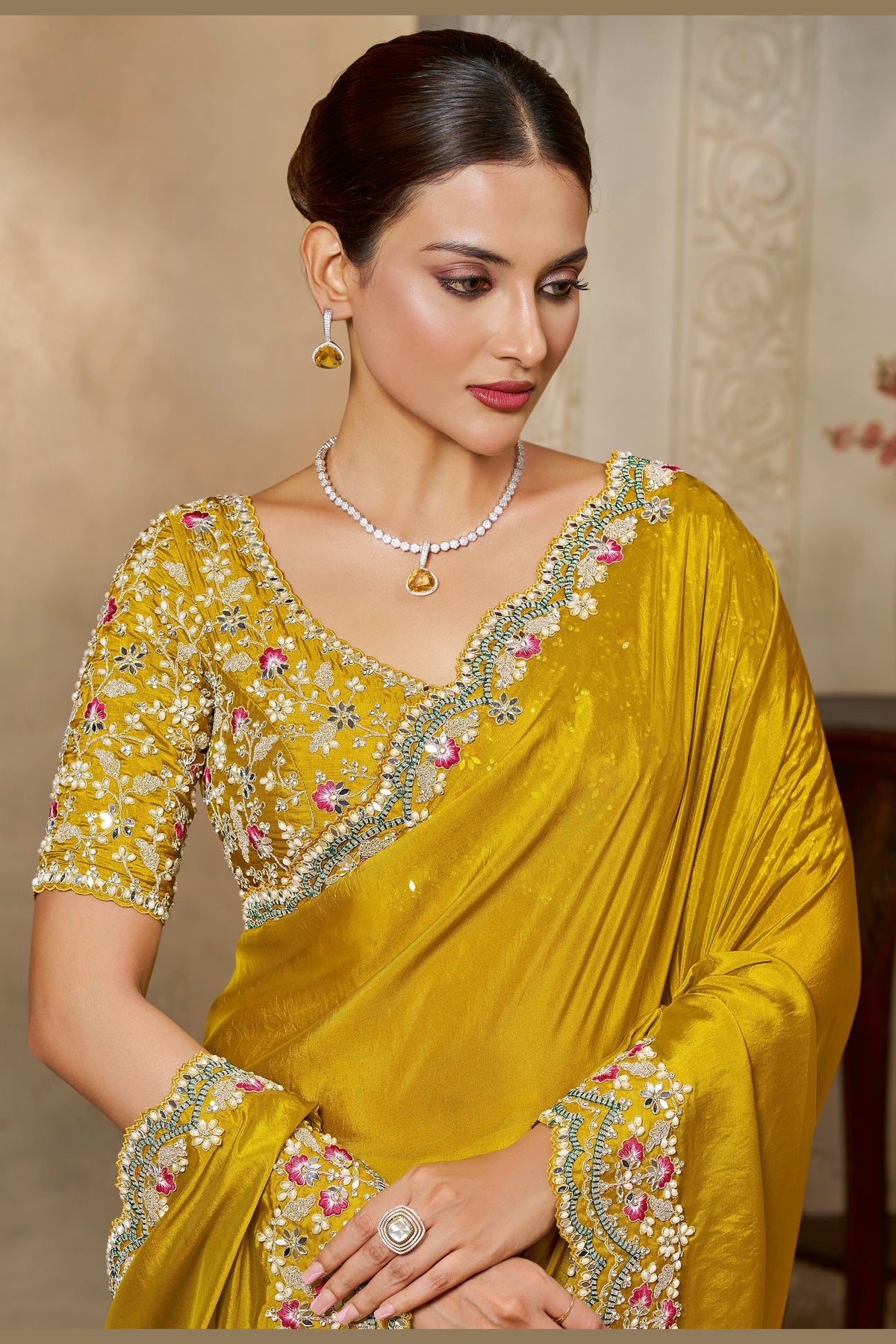 Mustard Yellow sequin saree with sequin and stone handwork, front view showing the embellished blouse and detailed border