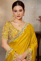 Mustard Yellow sequin saree with sequin and stone handwork, waist-down view of the pleats and flowing saree drape