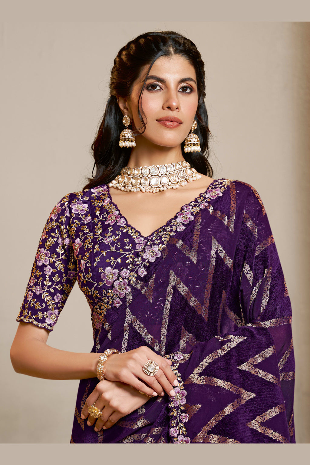 Purple embroidered saree with thread embroidery and stone handwork, front view showing the embellished blouse and detailed border