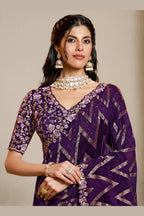 Purple embroidered saree with thread embroidery and stone handwork, front view showing the embellished blouse and detailed border