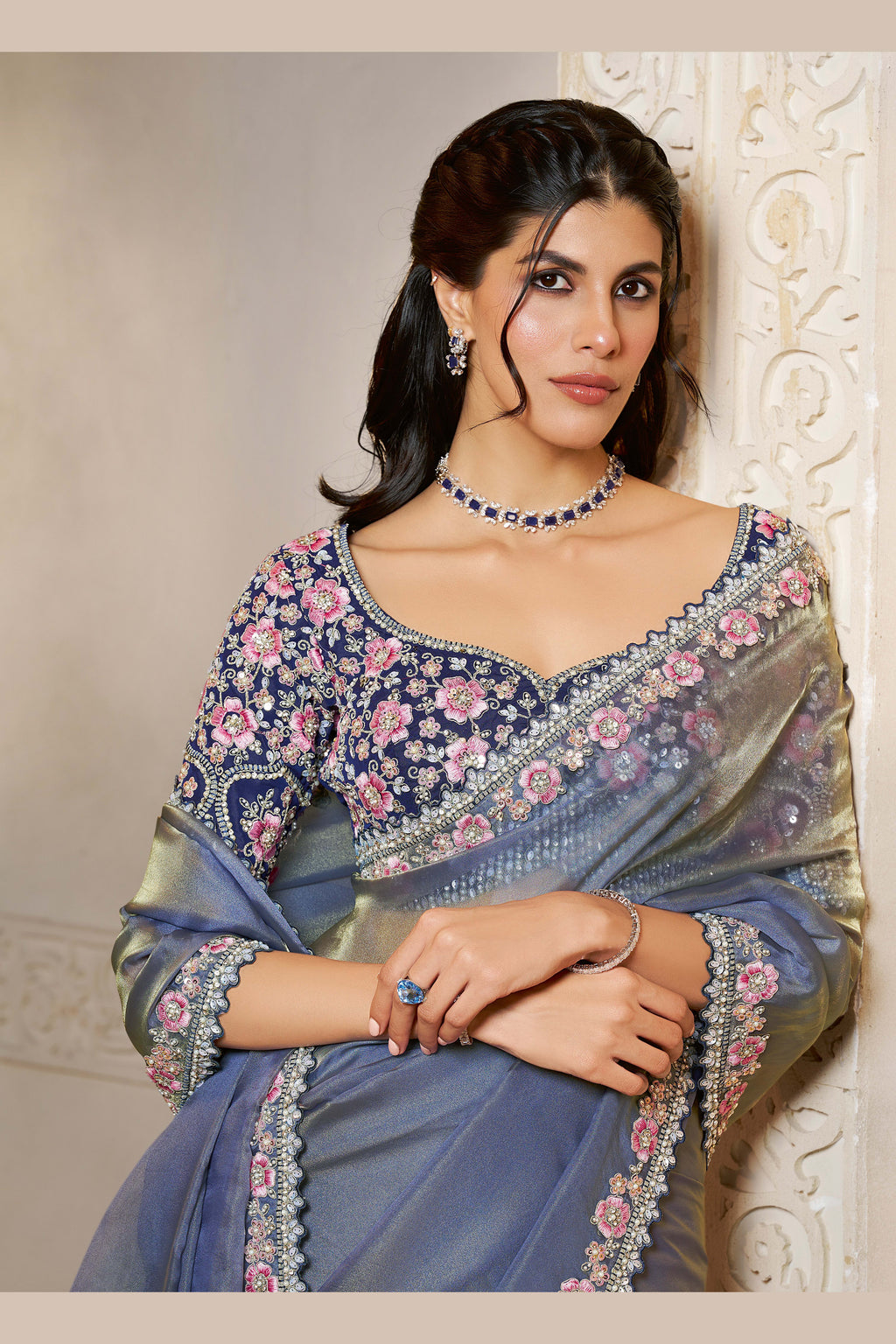Slate Blue saree for party with pearl, stone and thread handwork, front view showing the embellished blouse and detailed border