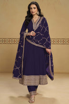 Woman wearing a dark purple kurta set for women in georgette with thread and sequin embroidery, georgette pant and dupatta, full front view.